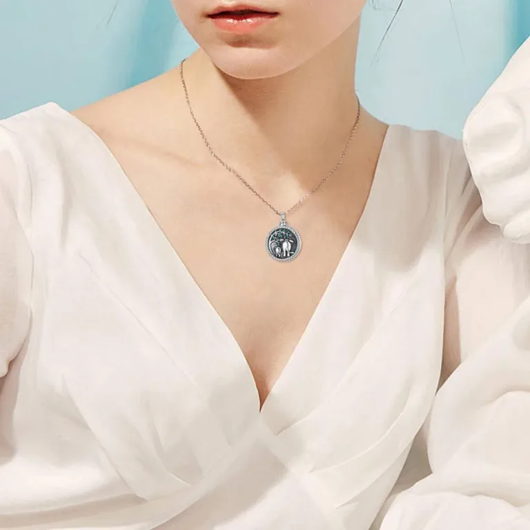 Runder Flacon oder Urne mit Elefanten und grünen Zirkonia | 925 Silber Medaillon brand: Eudora