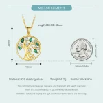 Goldener Lebensbaum Anhänger mit grünen Zirkonia Kristallen, 925 Silber Halskette. Detail: Mensch Silhouette im Baum.