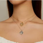 Gold & Silber Zirkonia Lebensbaum Anhänger mit grünen Kristallen an 925 Halskette. Filigraner Baum des Lebens mit Mensch Silhouette Detail.