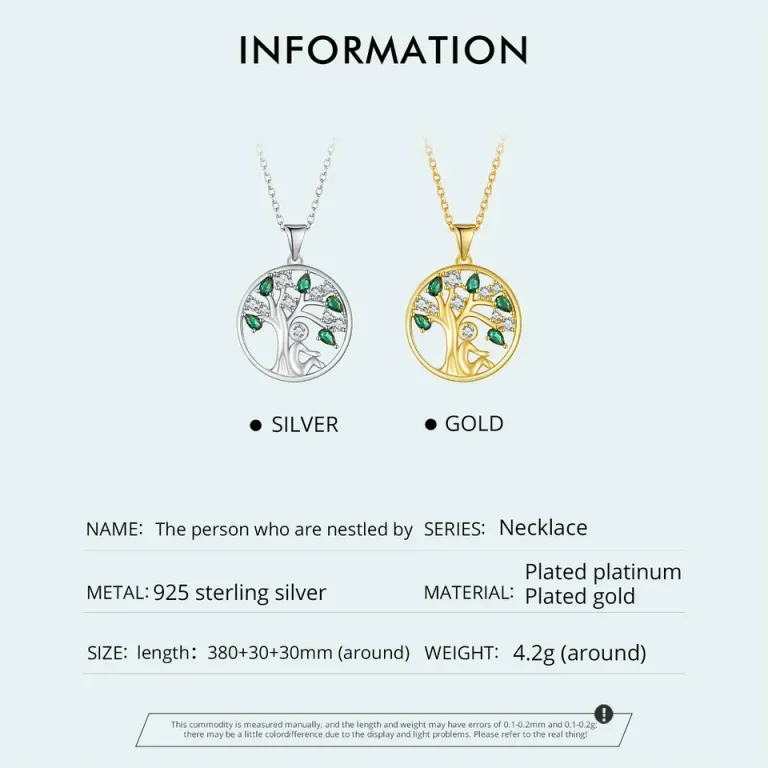 Zirkonia Lebensbaum Anhänger in Gold und Silber mit grünen Kristallen. 925 Halskette mit filigranem Lebensbaum und Mensch-Motiv.