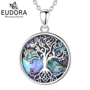 Verspielter Lebensbaum auf schimmerndem Perlmutt | 925 Silber Anhänger brand: Eudora