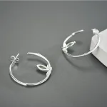 Bambus Ohrringe, teilvergoldete Halb-Creolen mit Aventurin Blatt | 925 Silber Ohrstecker brand: Lotus Fun