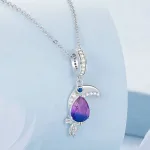 Tukan Dangle mit blau lila Regenbogen-Kristall, funkelnder Vogel Charm | 925 Silber Anhänger
