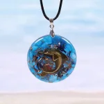 Delfin Orgonit, Blauer Leuchtstein-Anhänger mit Quarz und Perlmutt! Energie Halskette | Orgon Schmuck brand: OneQuarter