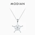 Funkelnde Winterstern Halskette: 925 Silber Anhänger mit klarem Kristall-Stern und Zirkonia Fünfstern für Sternenzauber. Detail: Facettierter Kristall.