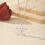 Funkelnde Winterstern Halskette: 925 Silber Anhänger mit klarem Kristall-Stern und Zirkonia Fünfstern für einen zauberhaften Sternenzauber.