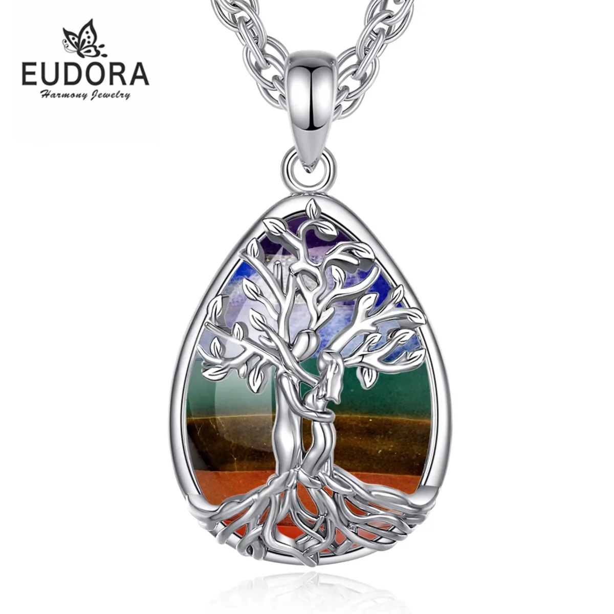 Lebensbaum Liebespaar Halskette Lebensbaum Liebespaar Halskette: Chakra-Heilstein Paar-Schmuck mit filigranem Baum und zarter Liebespaar-Silhouette im Silberrahmen.