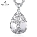 Silberner Lebensbaum Liebespaar Anhänger auf Quarz Kristall, Paar-Schmuck Halskette mit filigranem Baum und zarter Liebespaar-Silhouette.