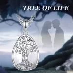 Lebensbaum Liebespaar Halskette: Paar-Schmuck Anhänger auf Quarz-Kristall Tropfen. Romantischer Edelstein Schmuck mit filigranem Design.