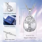 Lebensbaum Liebespaar Quarz-Kristall Halskette: Silberner Baum der Liebe Anhänger mit filigranem Paar-Motiv auf schimmerndem Quarz-Tropfen. Romantischer Edelstein Schmuck.