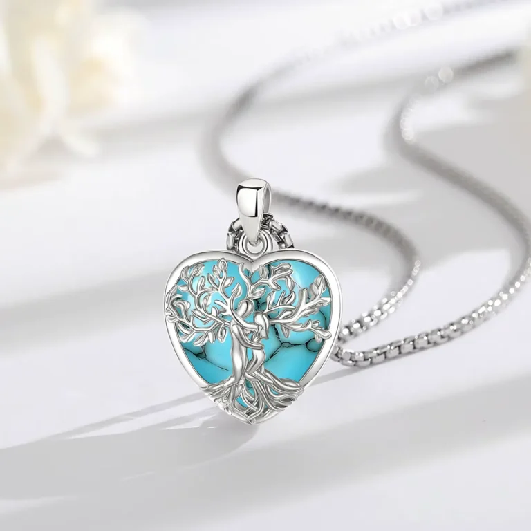 Türkis Herz Lebensbaum Halskette: Romantischer Paar-Schmuck mit Edelstein. Silberne Kette, filigrane Baum-Details, ideales Geschenk für Verliebte.