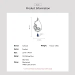 Funkelnder Leoparden-Anhänger mit Zirkonia-Pavé, Spinell und blauem Kristalltropfen. 925er Silber Pantherschmuck Anhänger im Detail.