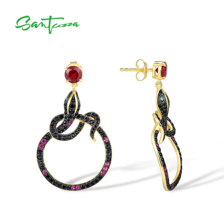 Schwarz-pinke Schlangen-Ohrhänger mit Spinell und Rubin, gefertigt aus 925 Silber und Gold. Die Ohrringe haben Ohrstecker.